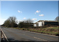 Agricultural sheds beside the A1075