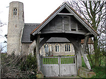 TG3233 : The church of All Saints with lych gate by Evelyn Simak