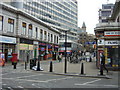 Cowcross Street outside Farringdon Station.