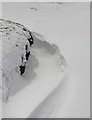 NT1515 : Peat hag snow drift by Walter Baxter