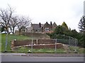 Demolished Toilets in Worrall, with converted School building in background