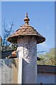 Detail of gate pillar of thatched cottage in West Wellow