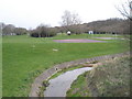 Stream flowing through recreation ground near Wakefords Way