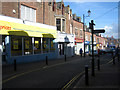 NY0336 : Shops in Senhouse Street by Phil Davies