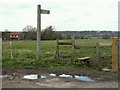 A stile and a footpath to Hylands Park