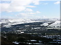 Scout Moor Wind Farm in the snow (from Holcombe Hill)