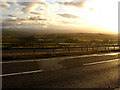 Across the A66 at sunset, storm clouds over lakeland