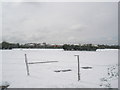 Looking across farmland adjoining Portsmouth Water Company  to Apollo Fire Alarms