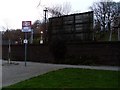 Sign and billboard at Dalmuir station