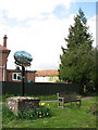 Village sign at corner of High Street