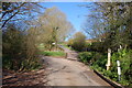 Spring sunshine and a dry ford in Ford Lane near Gorsley