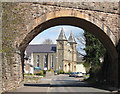 Baptist Church through the old railway bridge