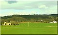 Fields and homes near Closeburn, seen from the train