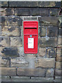 Post box within a garden wall at the top of Batley Field Hill