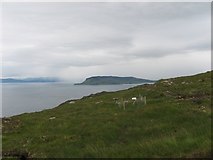 NM4194 : Coastal track with view of Eigg by trevor willis