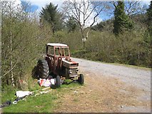 G9814 : Wayside tractor near Glen Bridge by Oliver Dixon