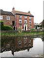 House by the canal basin