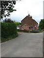 Terraced houses by bend in Chapel Road