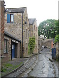 NY9364 : Cowgarth Burn running through Tanners Yard (2) by Mike Quinn