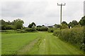 Approaching R. Hunt (agricultural engineers) depot, Martins Lane, Chilbolton