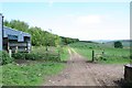 NU1016 : Farm track at Titlington Mount by Duncan Grey
