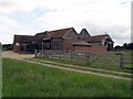 SO7554 : Folly Farm - converted barn and oast house by Peter Whatley
