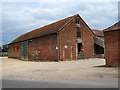 A large red-brick barn