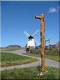 SH3485 : Totem pole and Llynnon Mill by Robin Drayton