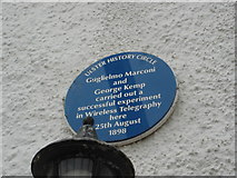 D1241 : Plaque on a Ballycastle house by Kay Atherton