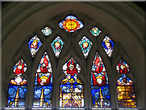 TG3505 : The church of St Nicholas - east window by Evelyn Simak