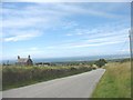 The steep descent on the Carmel-Groeslon road near Tyddyn Perthi