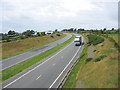 SH4474 : View west along the A55 from the Waen-hir bridge by Eric Jones