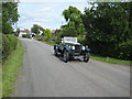 Vintage car passing through Pendock