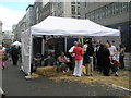 Trade stall at the mediaeval market in Cheapside