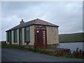 Telephone box on the road to Sandsound