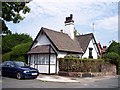 SJ4390 : Old toll house at Roby by Raymond Knapman