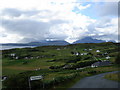 Tarskavaig and the village sign.  Cullin Hills in distance.