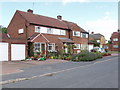 House with floral front garden in Heath Road, Beaconsfield