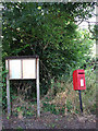 Postbox and church noticeboard