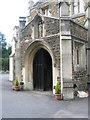 Church porch outside St Alban, Hindhead