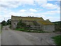 The sagging roof of an old barn at Carr Lane Farm