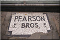 Mosaic in pavement, Pearsons, Enfield Town