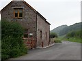 Stone wall cottage on the road to Llwyn-y-celyn farm