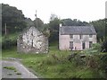 Farmhouse and outbuilding, at end of road