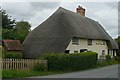 SU2131 : Thatched cottage, Pitton by Graham Horn