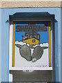 Shop sign at hairdresser shop in Scalloway