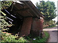 Cob and brick barn in a poor state