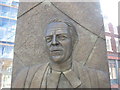 Detail from the statue of David Shepherd, the cricketer and former Anglican Bishop of Liverpool