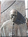 Detail from the statue of Derek Worlock, the former Catholic Archbishop of Liverpool