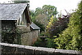 Buildings by Gatcombe Brook